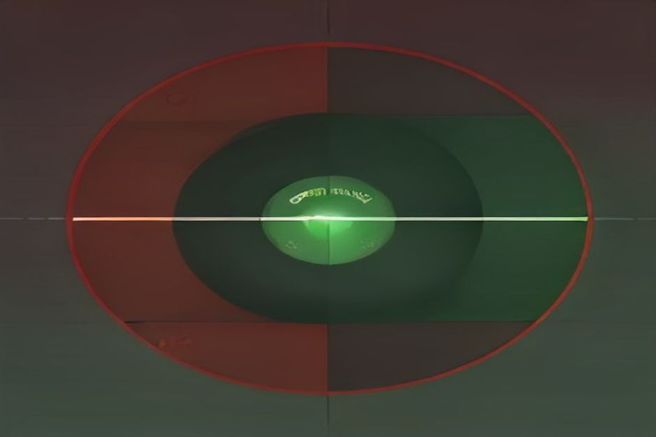 A dark observability dashboard, one metric line crossing a glowing green threshold into red, a monospace alert badge, cold grid of gauges